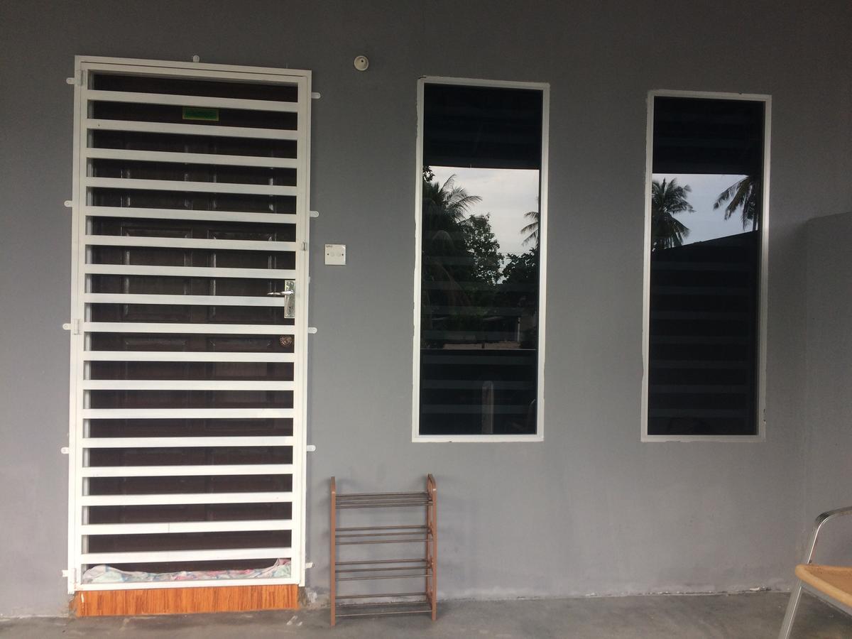 Roomstay Zulmi Arau Bagian luar foto